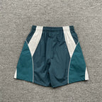Broken Planet Teal White Color‑Block Nylon Shorts