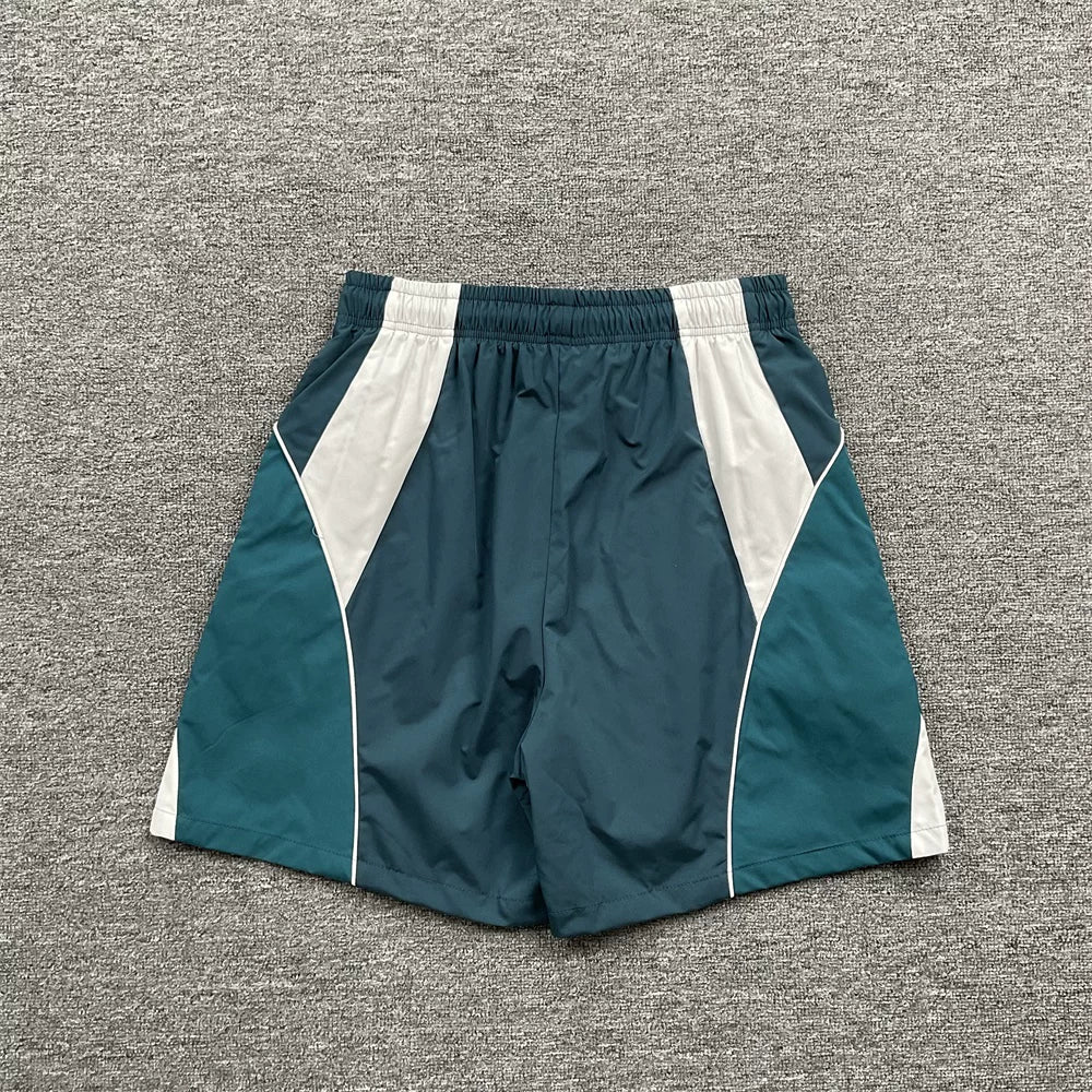 Broken Planet Teal White Color‑Block Nylon Shorts