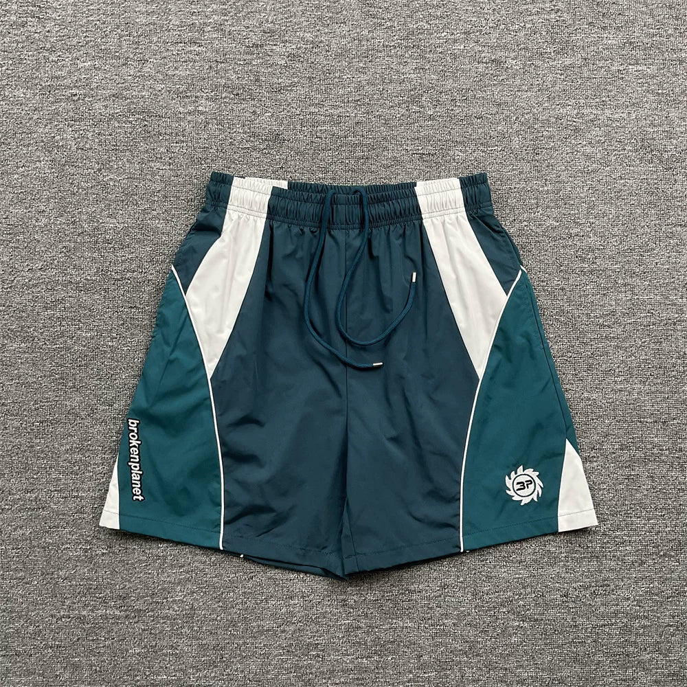 Broken Planet Teal White Color‑Block Nylon Shorts